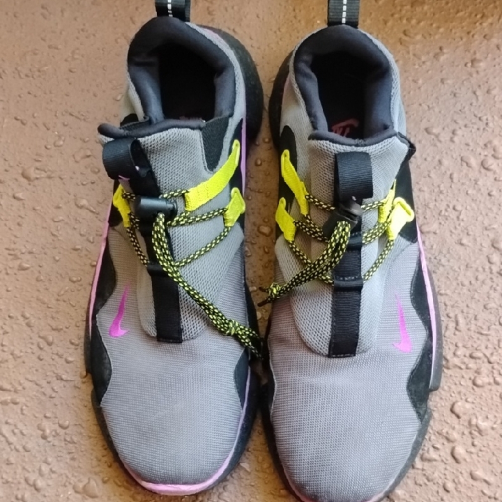 Nike Gray Athletic Shoes with Pink Swoosh and Yellow Accents